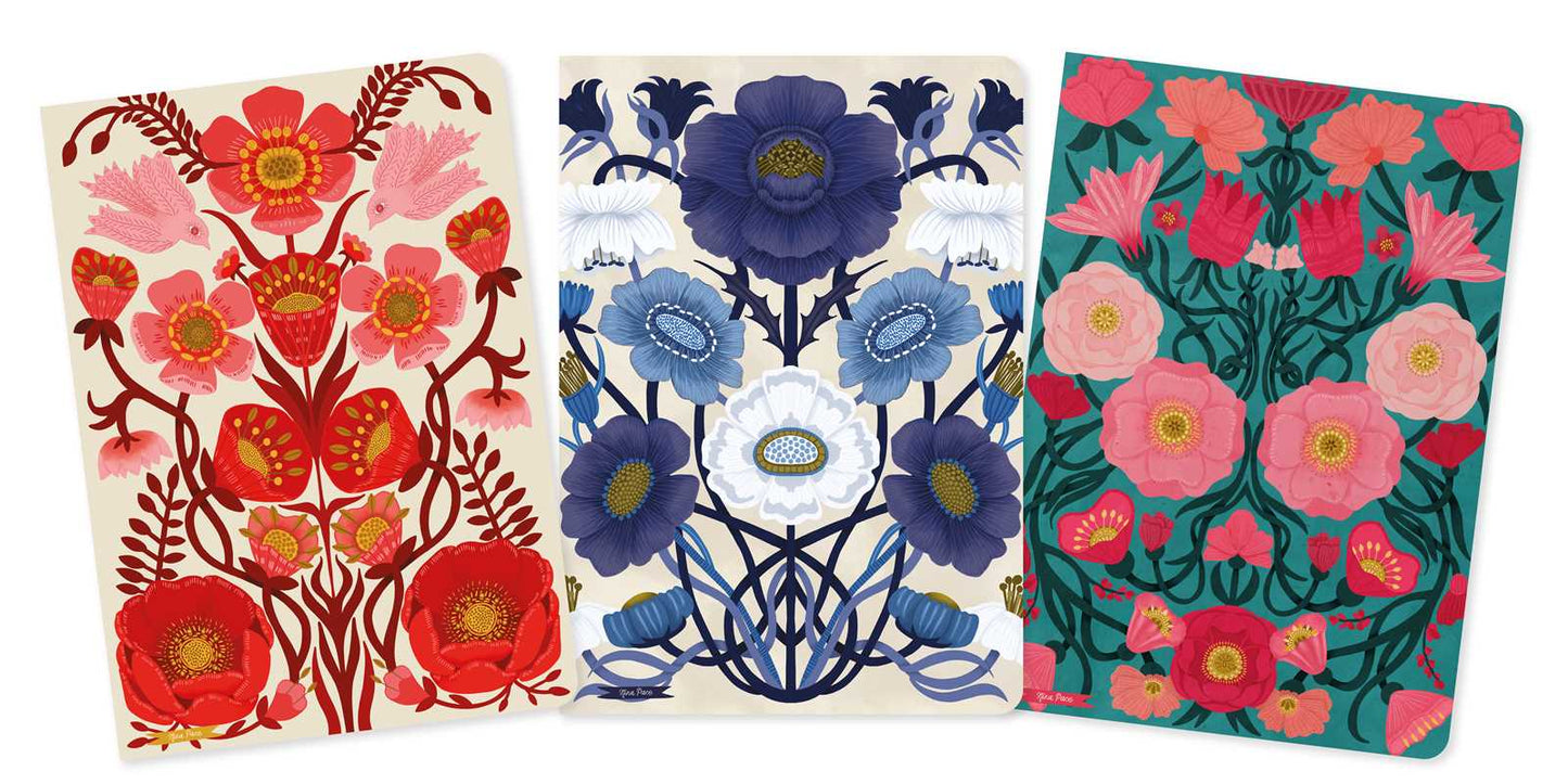 Three floral-patterned notebooks with vibrant colors on a white background