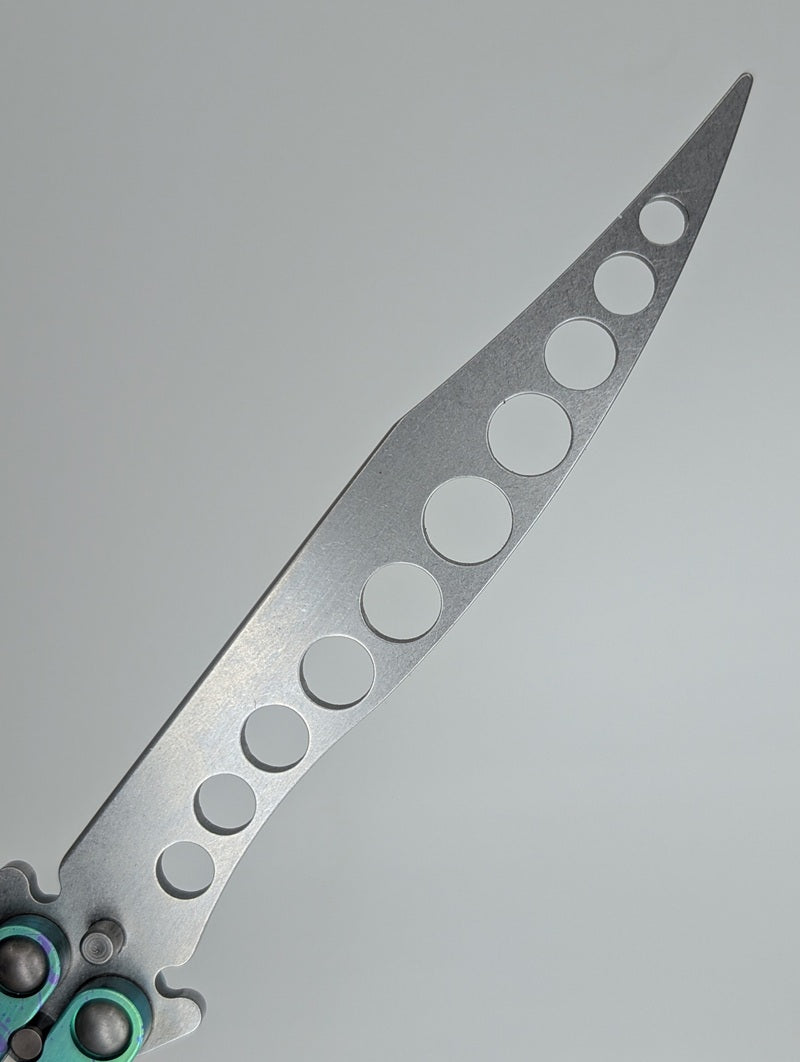 HOM Design Prodigy Titanium Green w/ Purple Splatter Balisong Trainer Mod. C