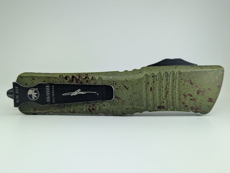 *Consignment* Microtech Combat Troodon D/E Outbreak Signature Series Deep Engraved Full Serrated Out the Front Knife