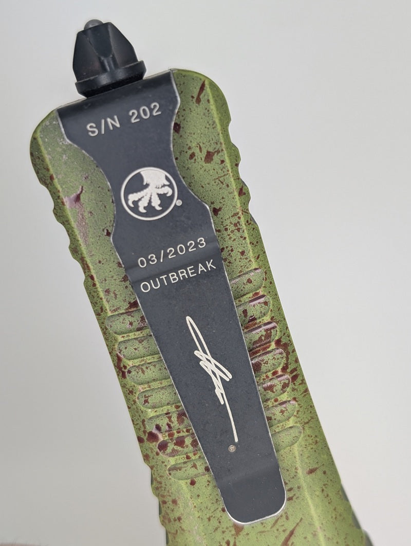 *Consignment* Microtech Combat Troodon D/E Outbreak Signature Series Deep Engraved Full Serrated Out the Front Knife