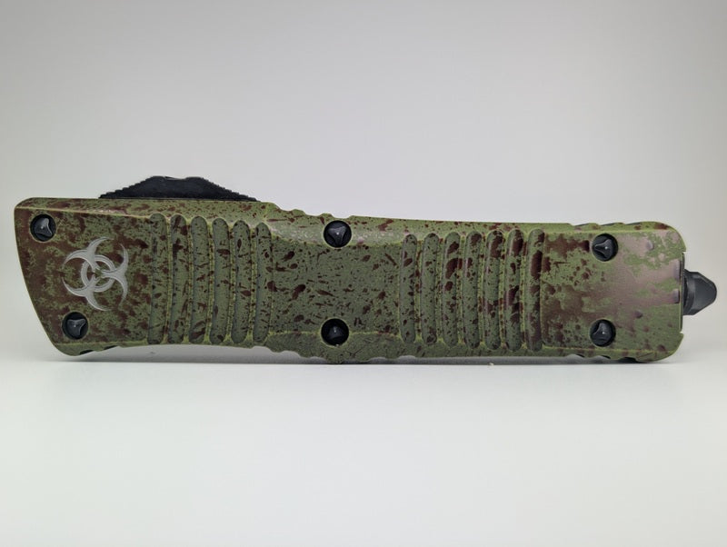 *Consignment* Microtech Combat Troodon D/E Outbreak Signature Series Deep Engraved Full Serrated Out the Front Knife