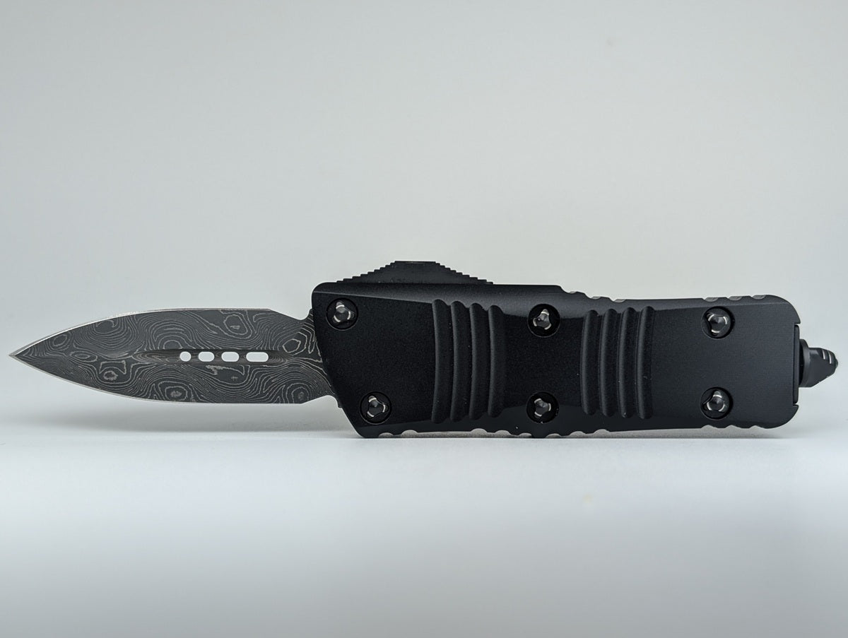 *Consignment* Microtech Troodon Mini D/E Damascus Signature Series Aluminum w/ Ringed Hardware Out the Front Knife