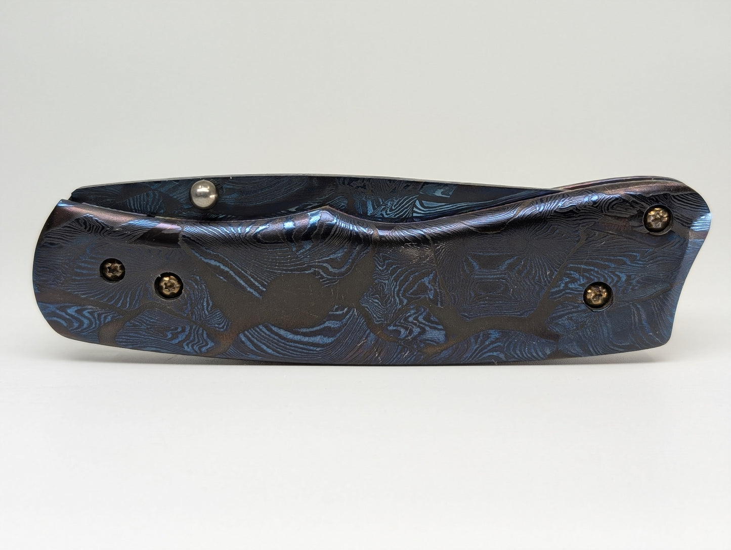 Caffrey Master Smith Custom Fossil Blue Damascus Blade and Handle Linerlock Folding Knife