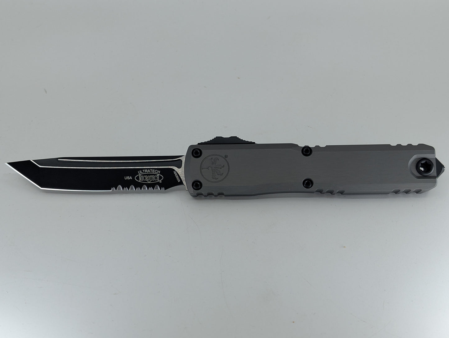 Microtech Ultratech ZBP T/E Natural Clear | Black Partial Serrated Blade Out the Front Knife