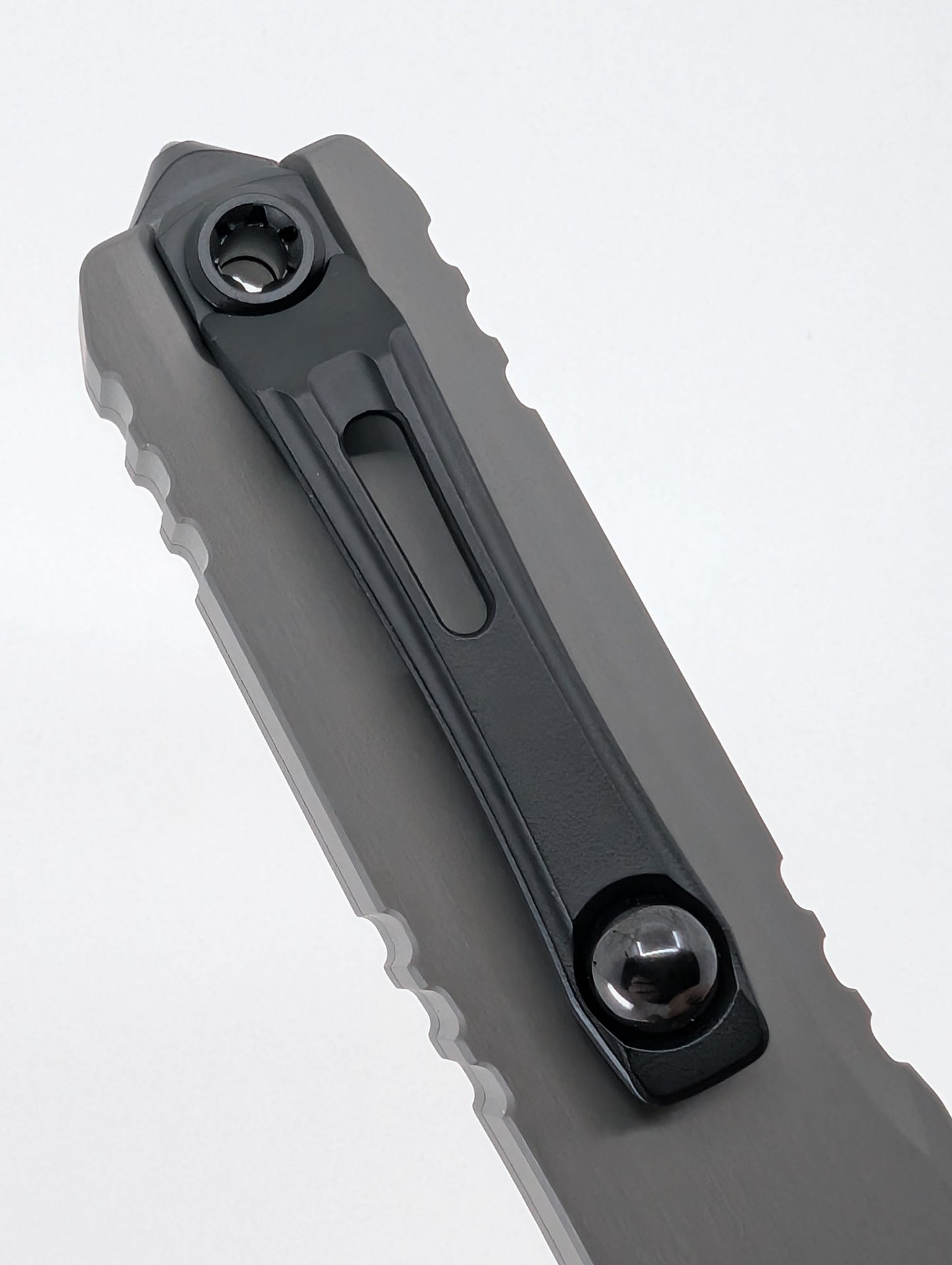 Microtech Ultratech ZBP T/E Natural Clear | Black Partial Serrated Blade Out the Front Knife
