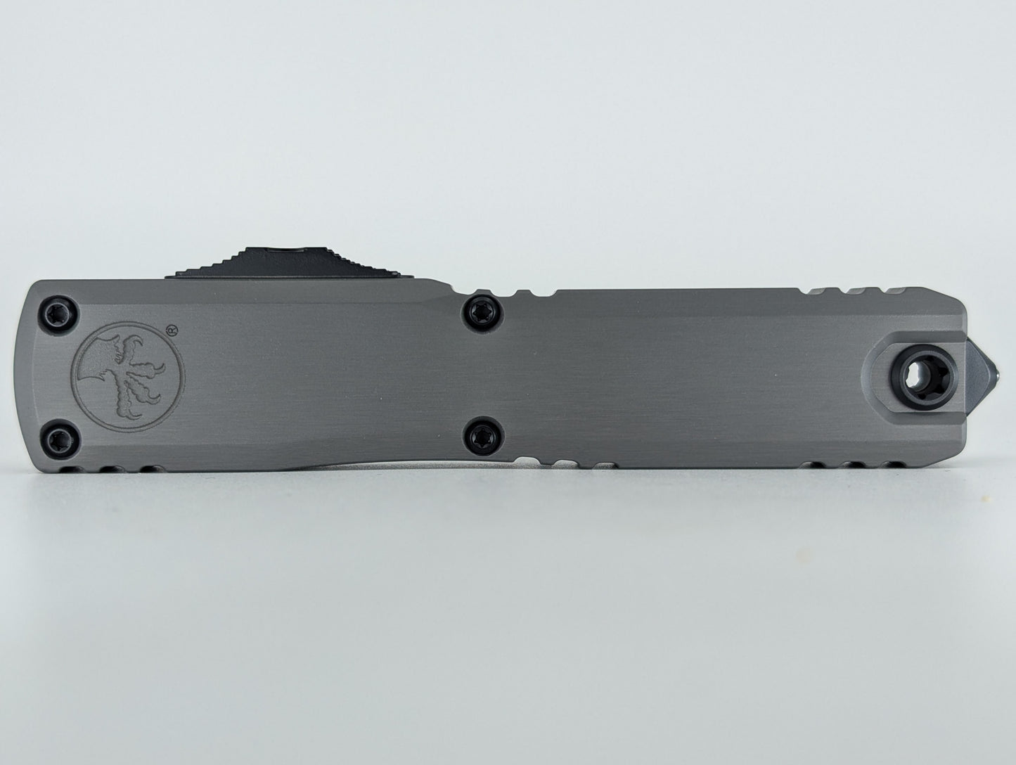 Microtech Ultratech ZBP T/E Natural Clear | Black Partial Serrated Blade Out the Front Knife