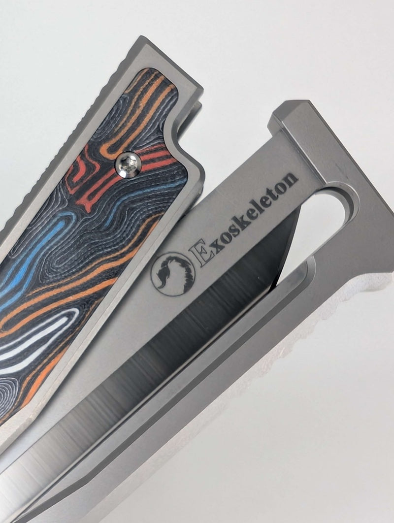 Reate EXO-M Damascus Red/White/Blue Handle Design Satin Drop Point Blade Gravity Knife