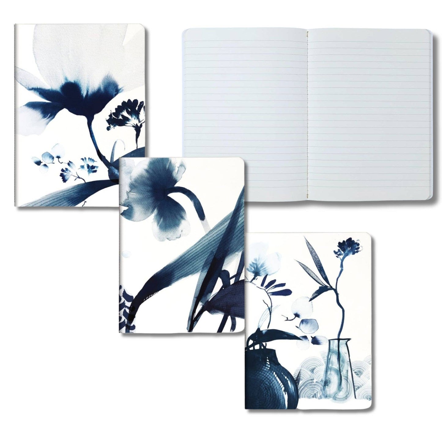 Floral design notebooks and a journal on a white background
