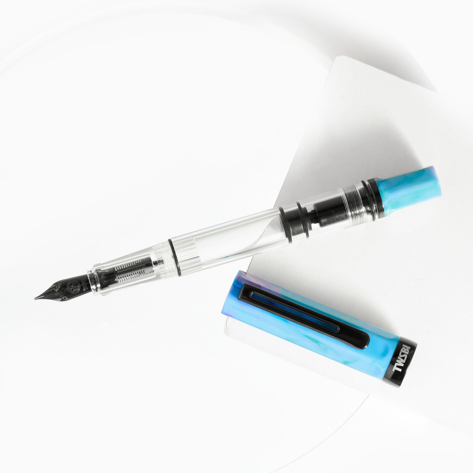 Twsbi Eco Fountain pen with a blue clip on a white background