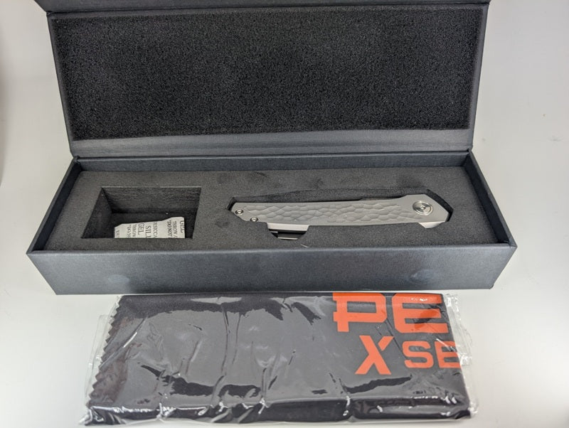 *Consignment* Enrique Peña X Series Cobra Titanium Jigged Dark Bead Blast Framelock Folding Knife