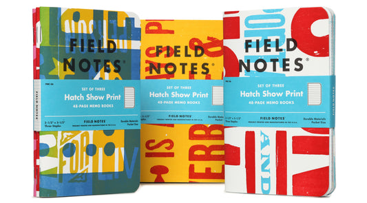 Three Field Notes notebooks with colorful covers and 'Hatch Show Print' branding.