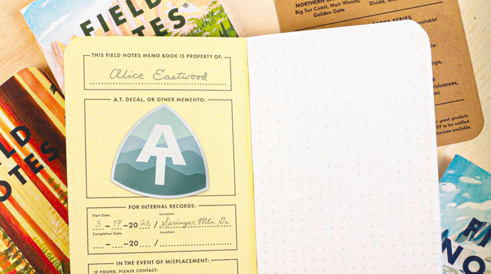 Field notes memo book with branding on a textured surface