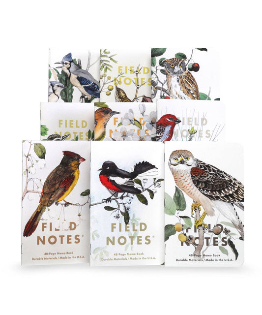Set of Field Notes notebooks with bird illustrations on the covers.