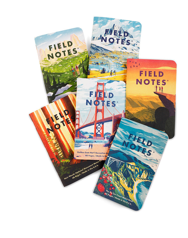 Explore America set of Field Notes notebooks with various scenic covers on a white background