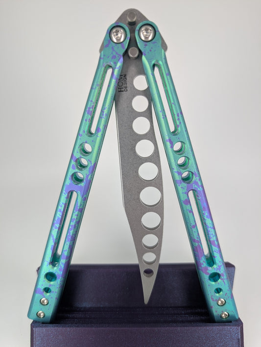 HOM Design Prodigy Titanium Green w/ Purple Splatter Balisong Trainer Mod. C