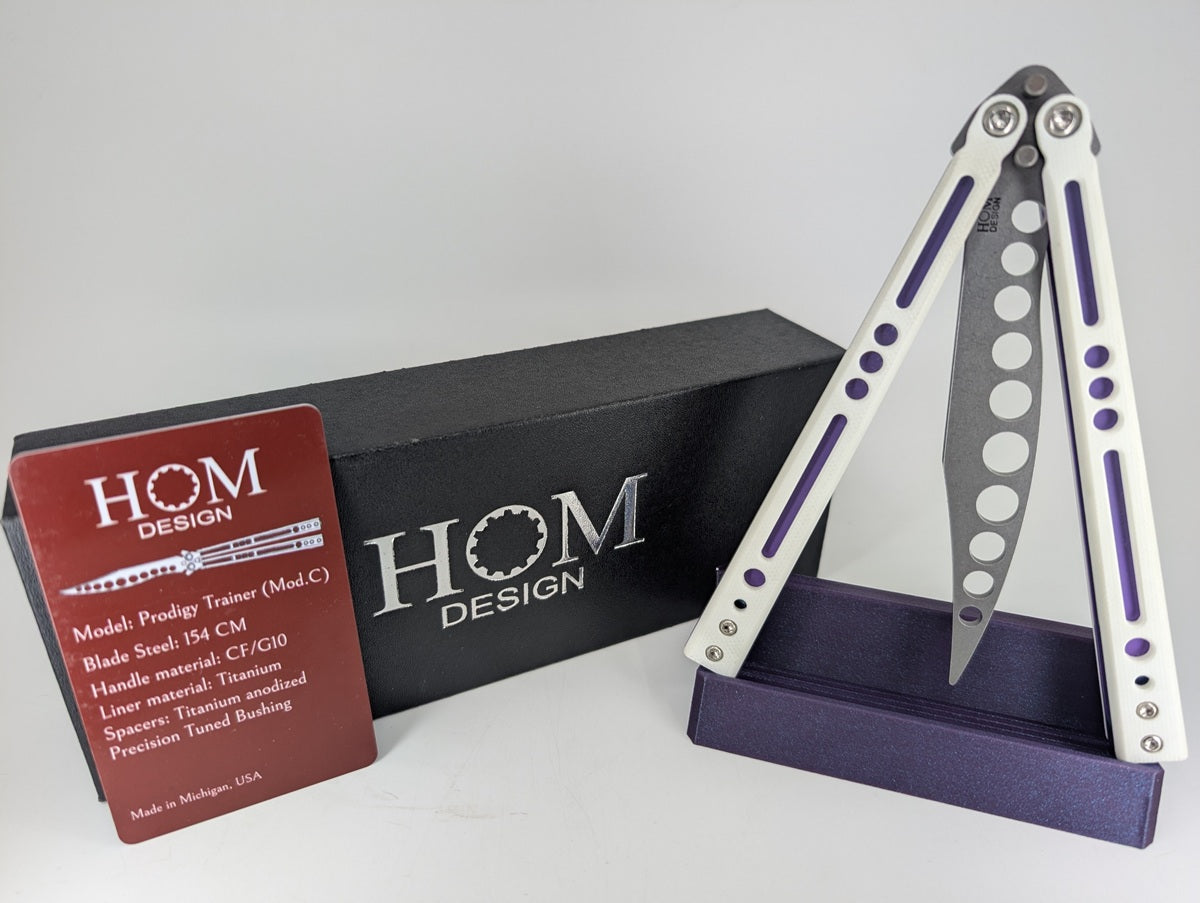 HOM Design Prodigy White G10 / Purple Ti / Blue Ti Spacer Balisong Trainer Mod. C