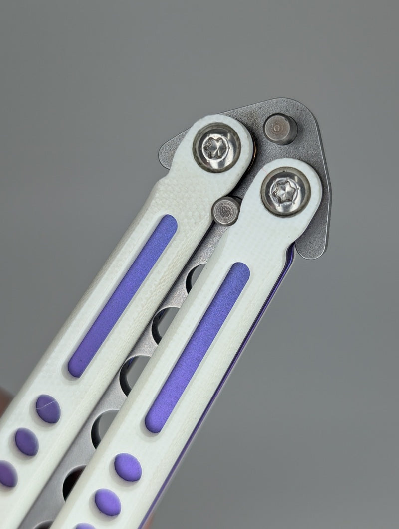 HOM Design Prodigy White G10 / Purple Ti / Blue Ti Spacer Balisong Trainer Mod. C