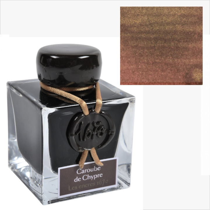 Ink bottle labeled 'Caroube de Chypre' with a color swatch inset on a white background