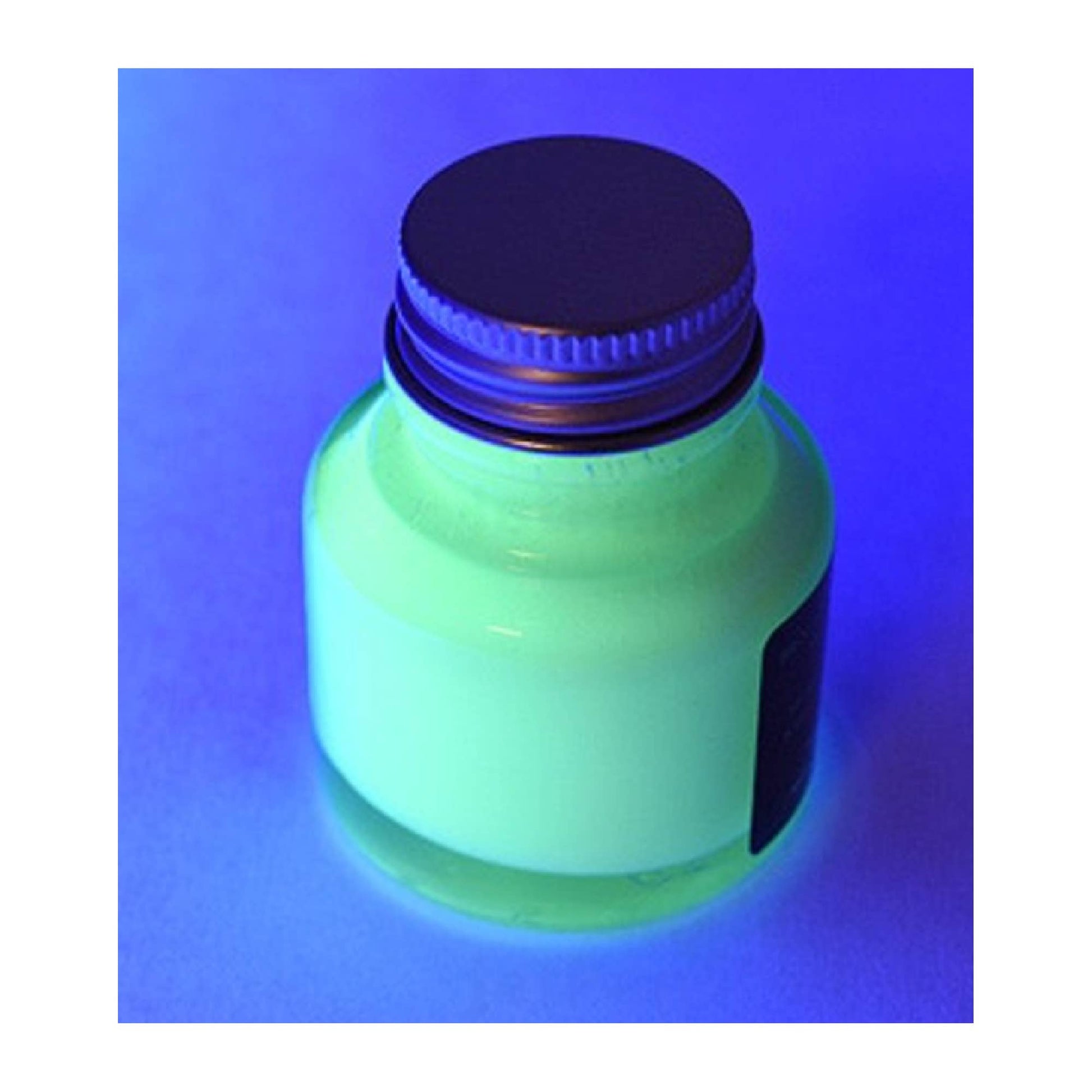 Green glowing ink in a jar with a blue cap on a blue background
