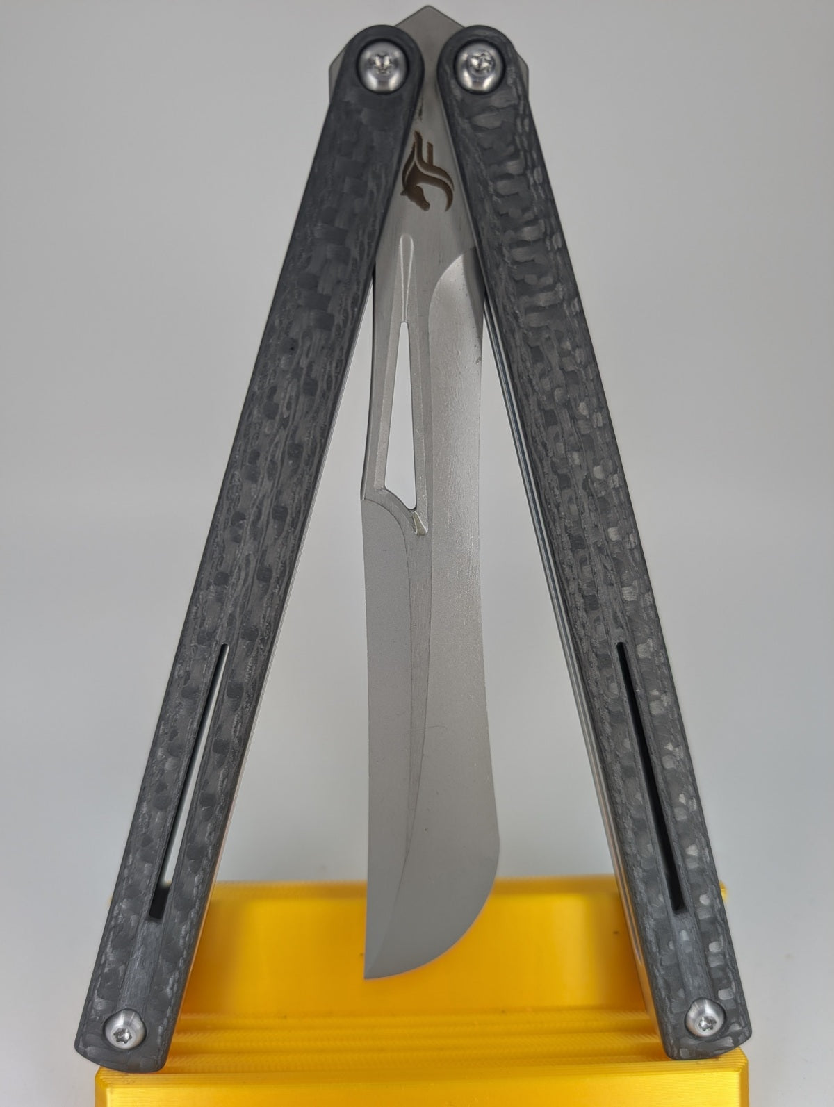 JF Knifeworks: The Beak Electro Carbon Fiber Balisong Trainer