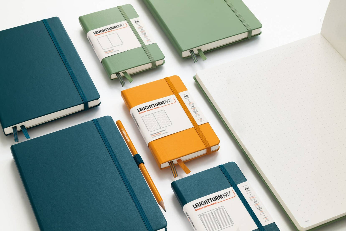 LEUCHTTURM1917 Notebooks - Pocket (A6) and a pen on a white background