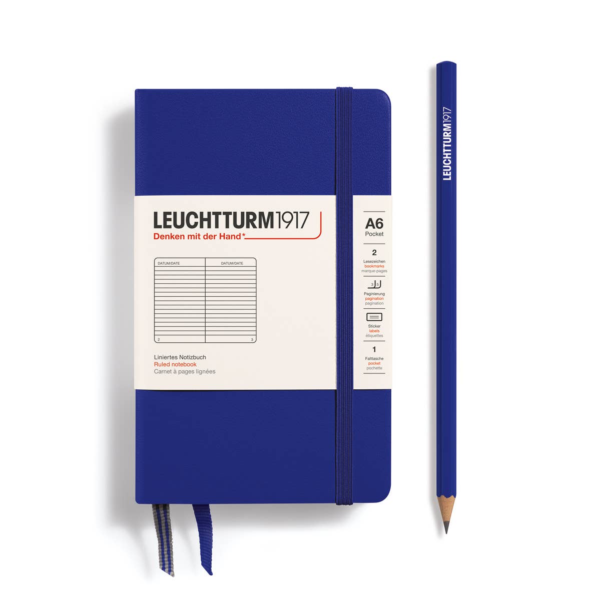 Pocket (A6) Blue notebook with white cover and a pencil on a white background, featuring Leuchtturm1917 branding.