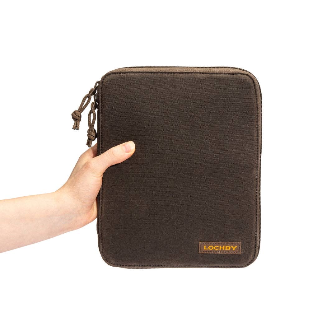 Brown zippered pouch held by a hand on a white background, with 'Lochby' branding.