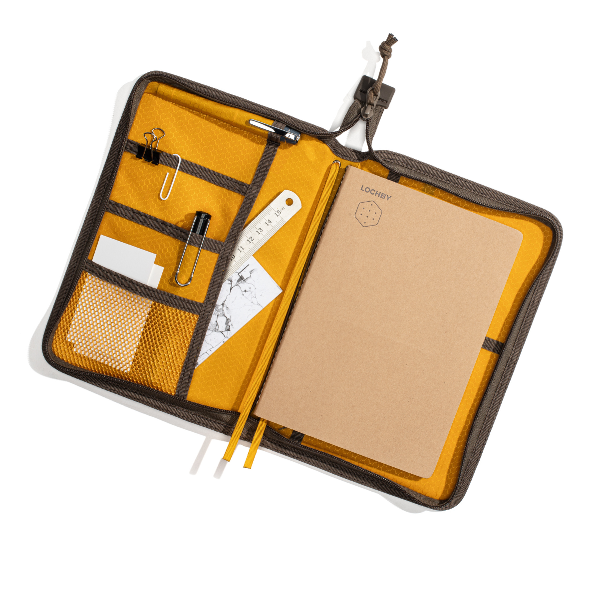 Open LOCHBY Field Folio A5  notebook with yellow interior and pen holder on a white background