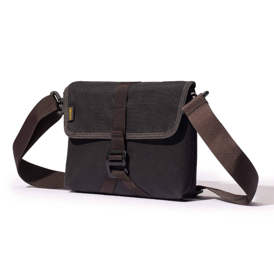 Black shoulder bag on a white background