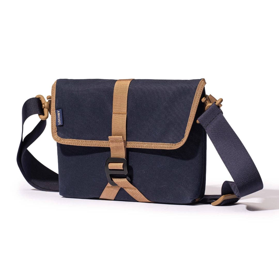 Navy blue LOCHBY bag with brown accents on a white background

