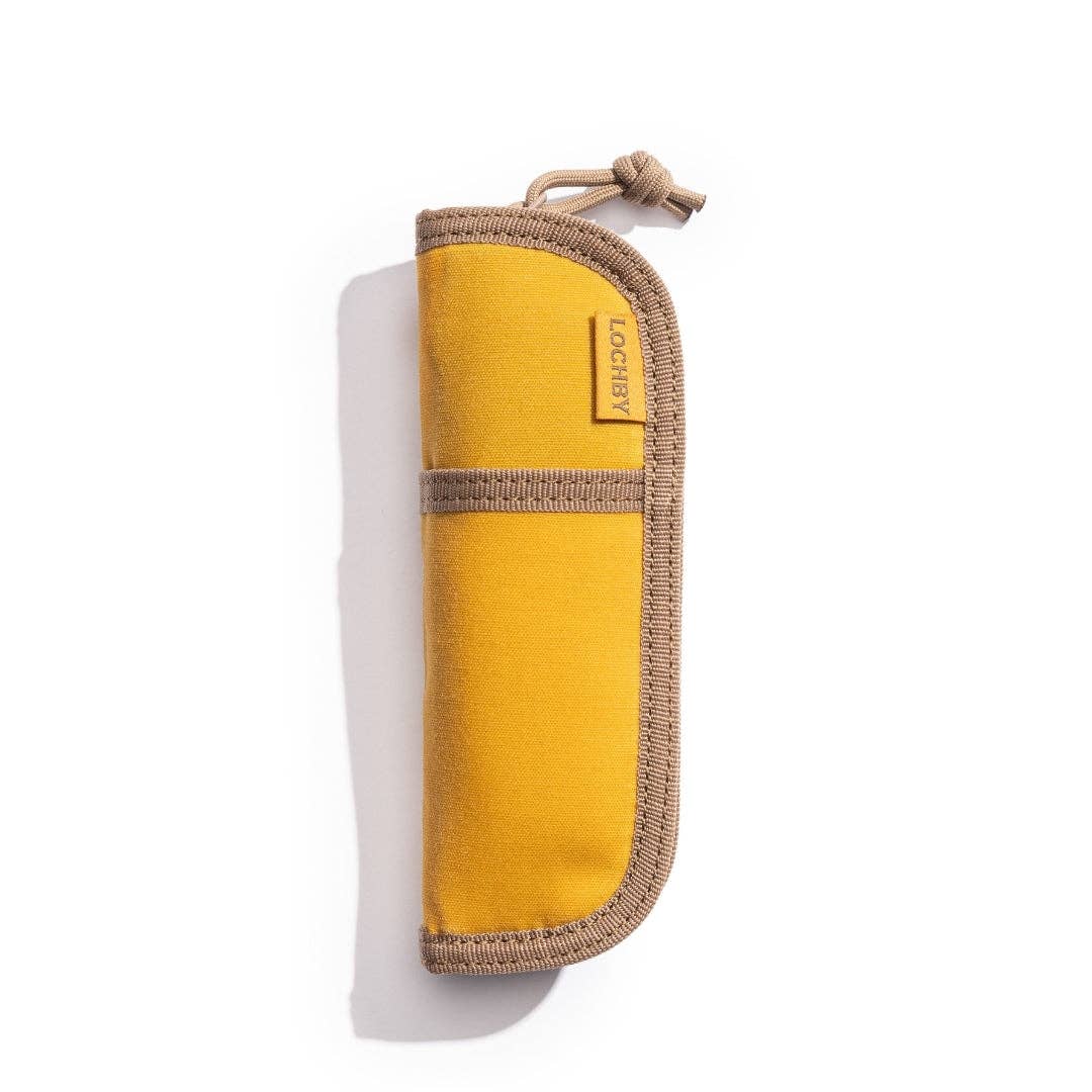 Yellow and brown LOCHBY pen with a brand logo on a white background
