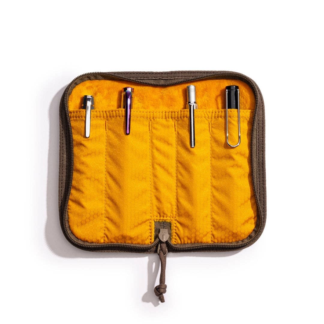 LOCHBY Quattro V2 - Yellow zippered pouch with brown trim containing three silver tools on a white background