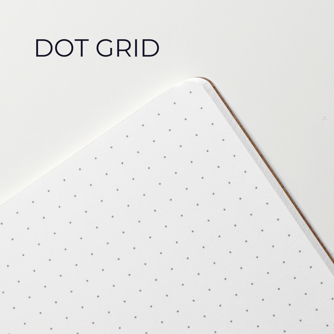Sheet of dot grid paper with a white border on a light gray background.