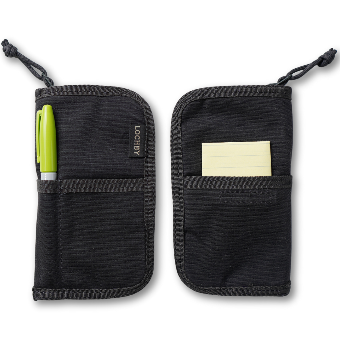 Lochby Quattro Pen Holder in Black  with a pen and sticky notes on a white background