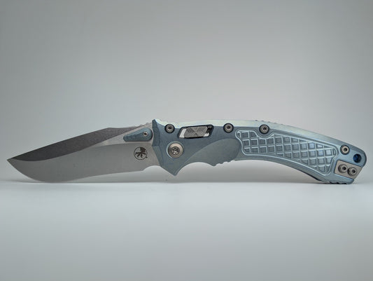 Microtech Amphibian RAM-LOK Marfione Select Ice Blue Frag Titanium Folding Knife