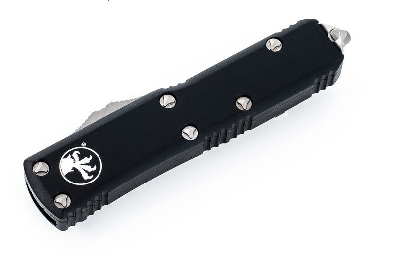 Microtech-UTX-85-Black-Full-Serrated-Out-The-Front-Knife-Closed