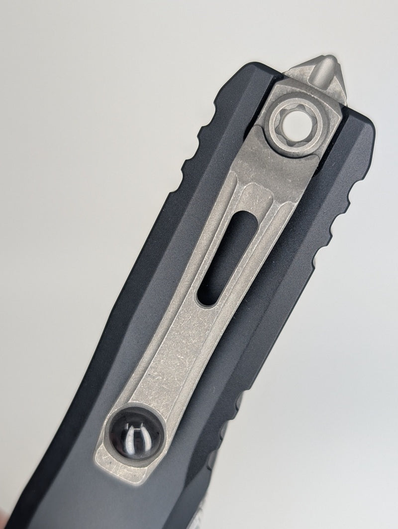 Microtech UTX-85 S/E Gen IV Black Apocalyptic Partial Serrated Out the Front Knife