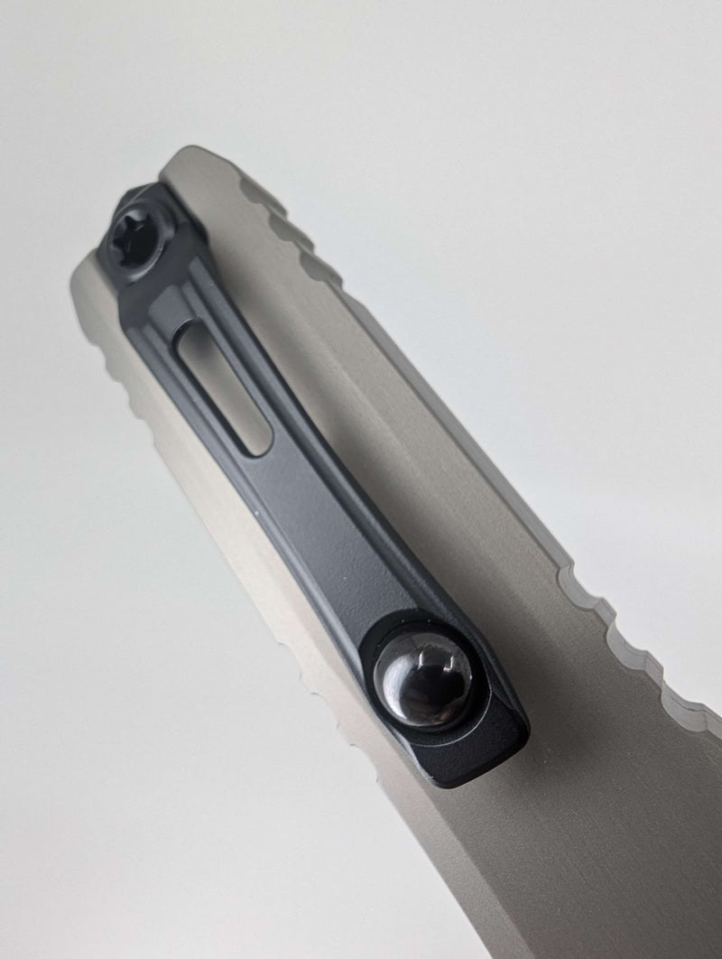Microtech Ultratech ZBP D/E Natural Clear Partial Serrated Black Blade Out the Front Knife