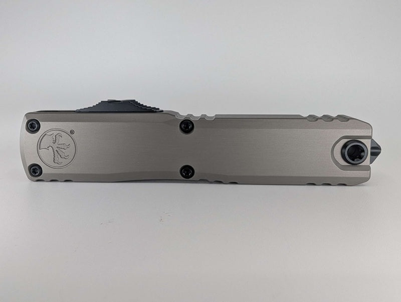 Microtech Ultratech ZBP D/E Natural Clear Partial Serrated Black Blade Out the Front Knife