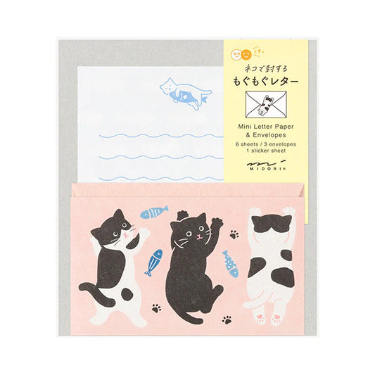 Cat-themed mini letter paper set with envelopes and stickers on a white background