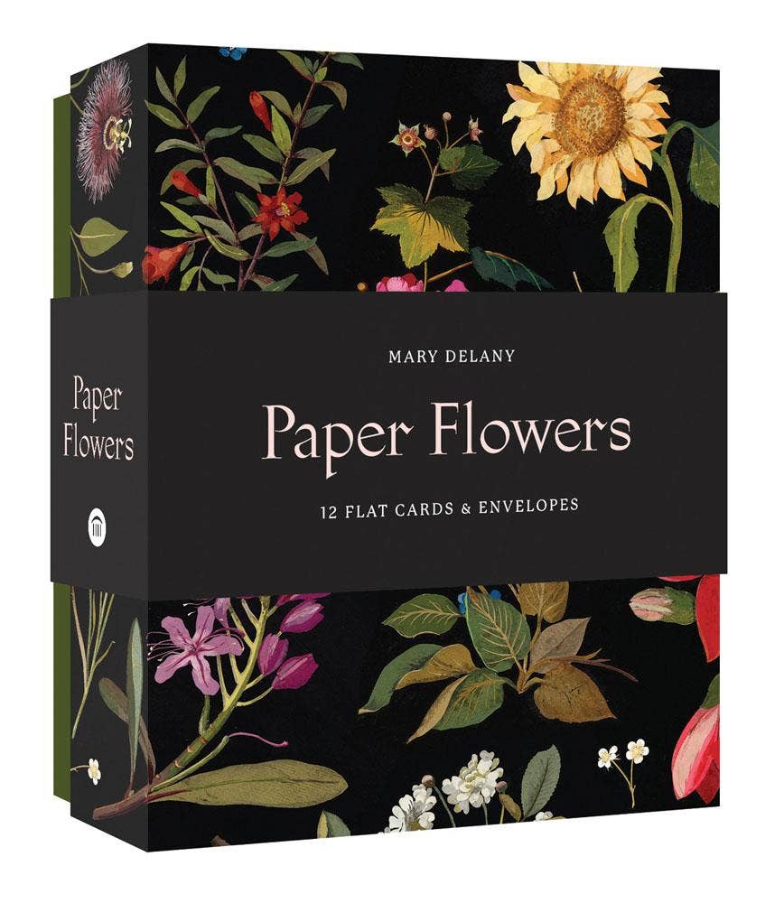 Paper Flowers card deck box by Mary Delany, featuring a black background with vintage-style floral illustrations including a sunflower, pink blossoms, and green leaves. The front has a wide black band with the title 'Paper Flowers' and '12 Flat Cards & Envelopes' in white text.