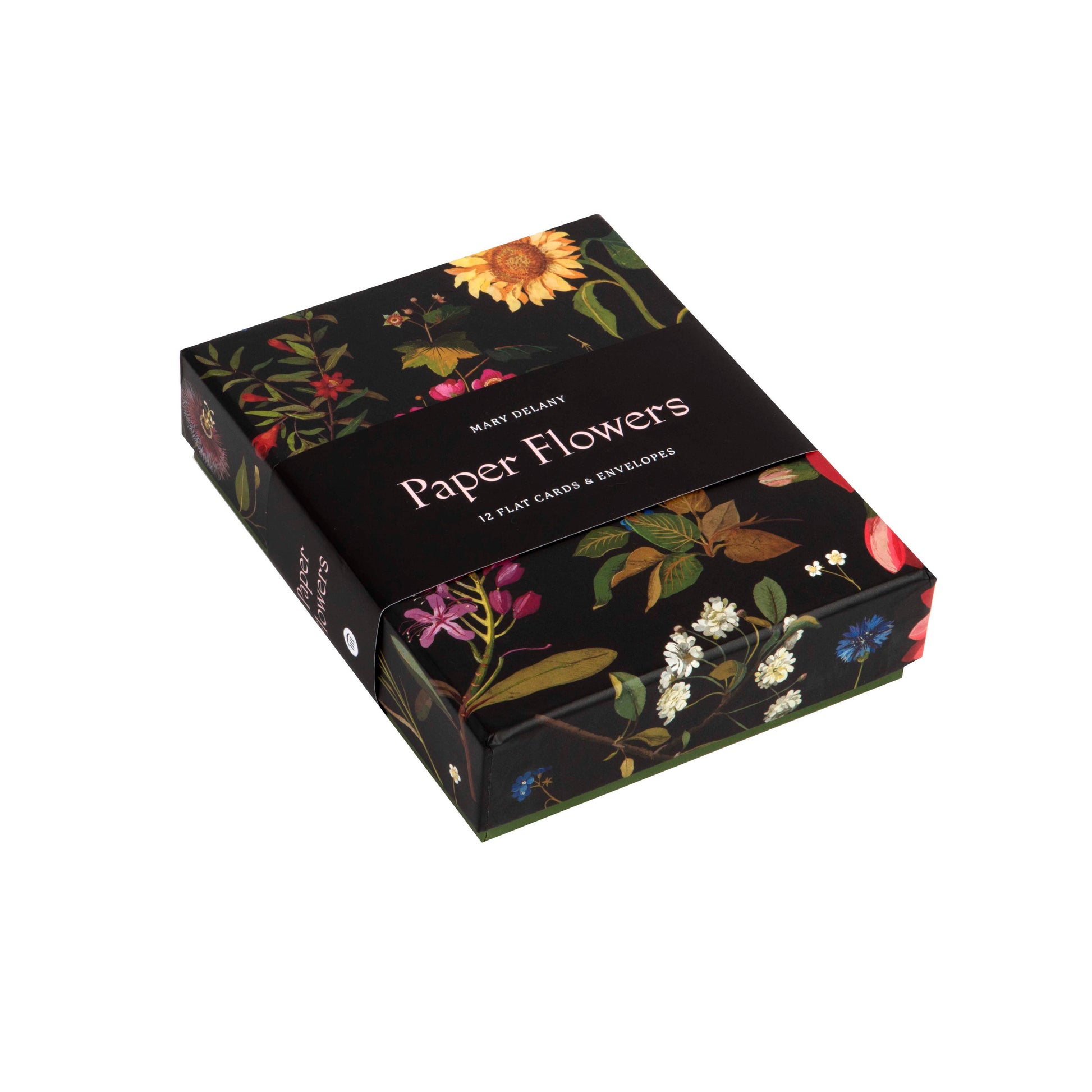 Box of paper flowers with floral designs on a white background