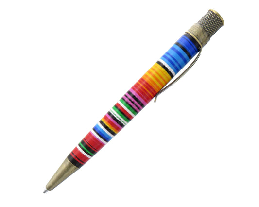 A ballpoint pen with a colorful striped handle, featuring blue, yellow, orange, pink, green, red, and black stripes, with a gold-toned metal tip and cap on a white background.