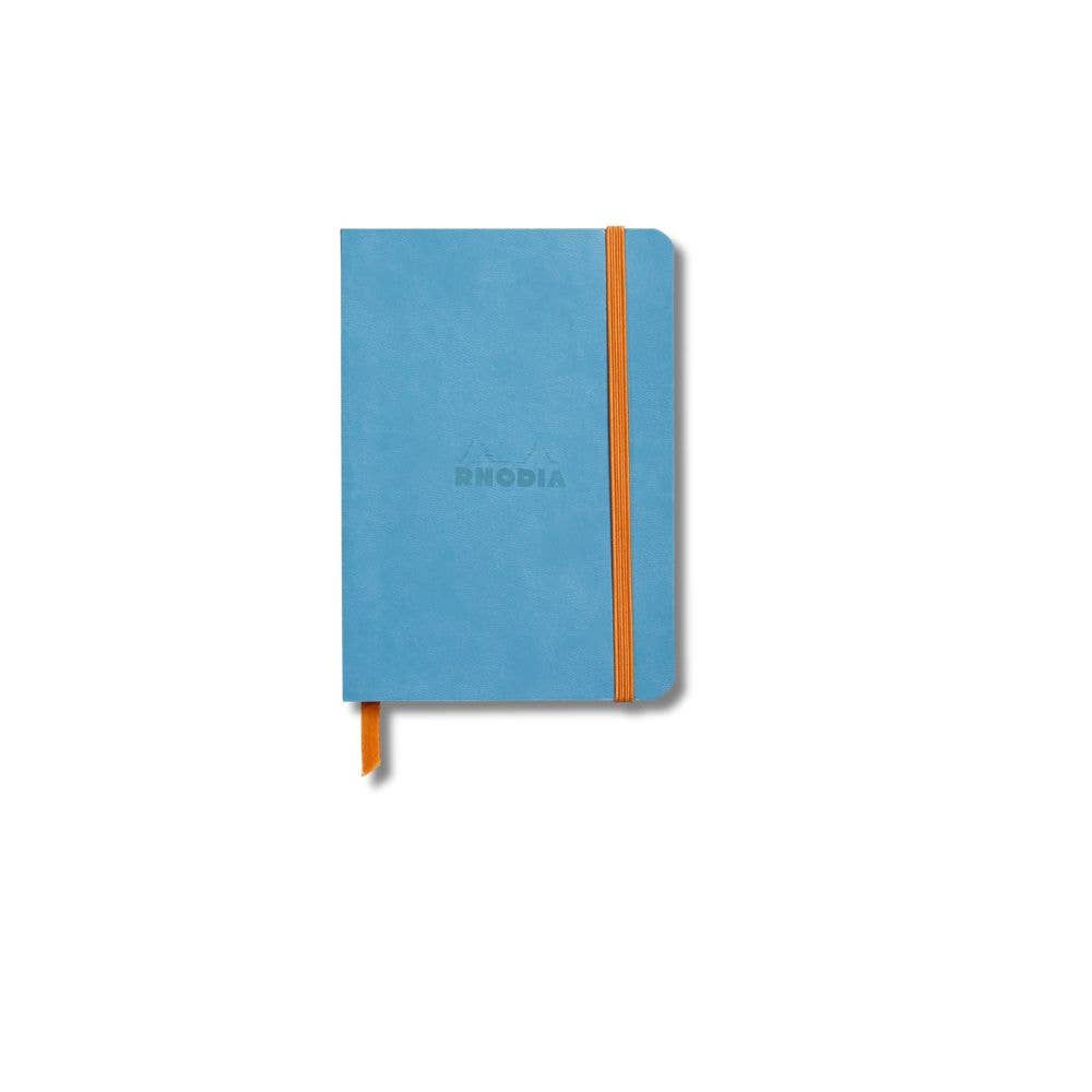 Rhodiarama Softcover A6 Turquoise notebook with an orange elastic closure band and matching orange ribbon bookmark, featuring the embossed brand name 'RHODIA' on the front, set against a plain white background.