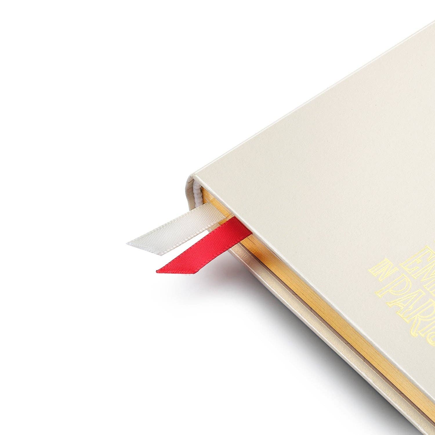 Close-up of a notebook with a red bookmark on a white background