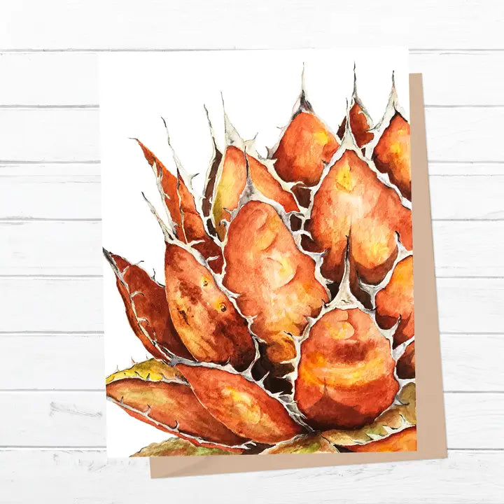 Greeting card with watercolor design of fall agave on a wooden surface