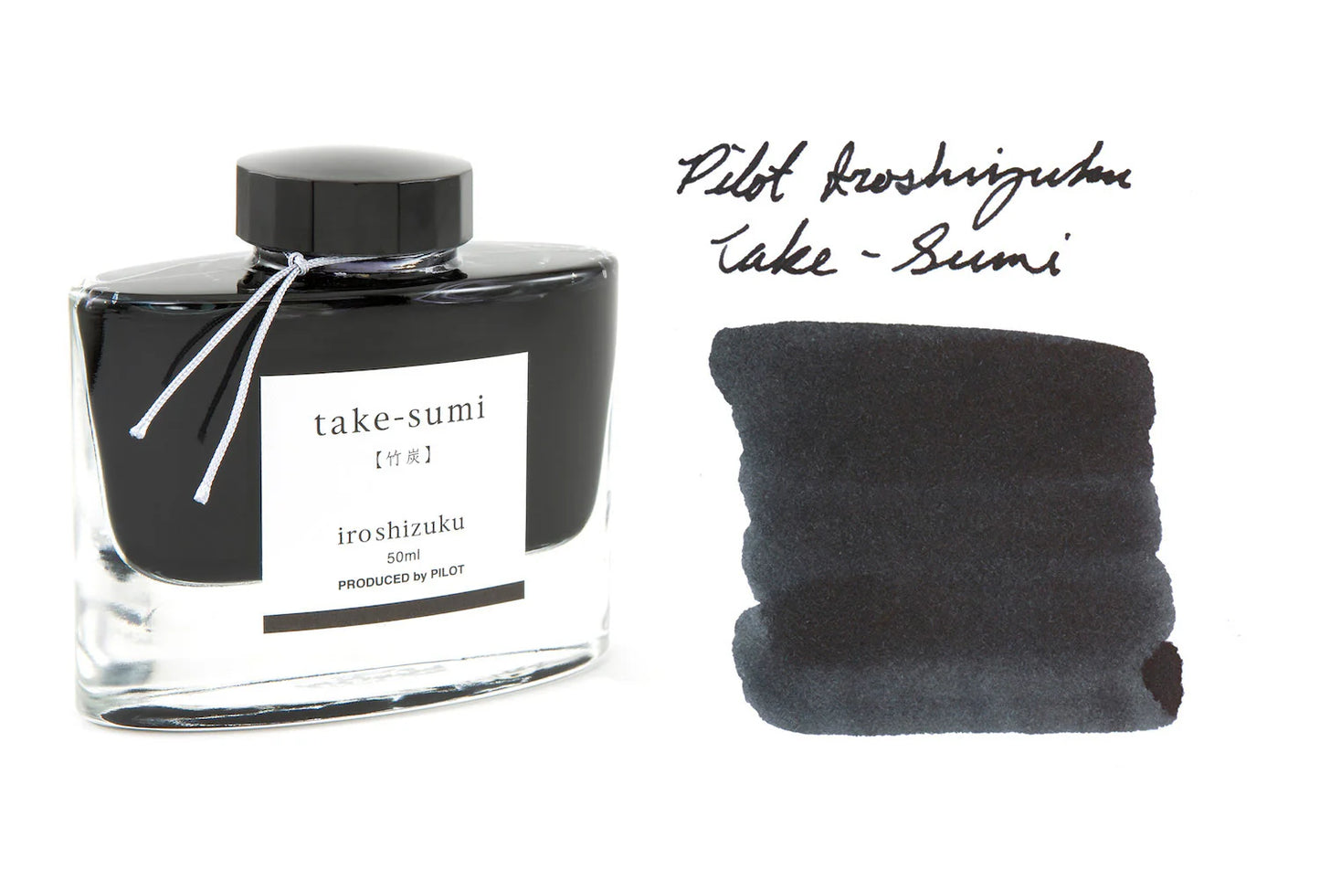 Ink bottle labeled 'take-sumi' and a black ink pad on a white background